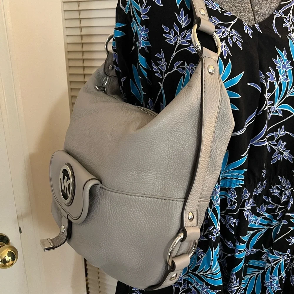Michael Kors hobo handbag with silver color hardware